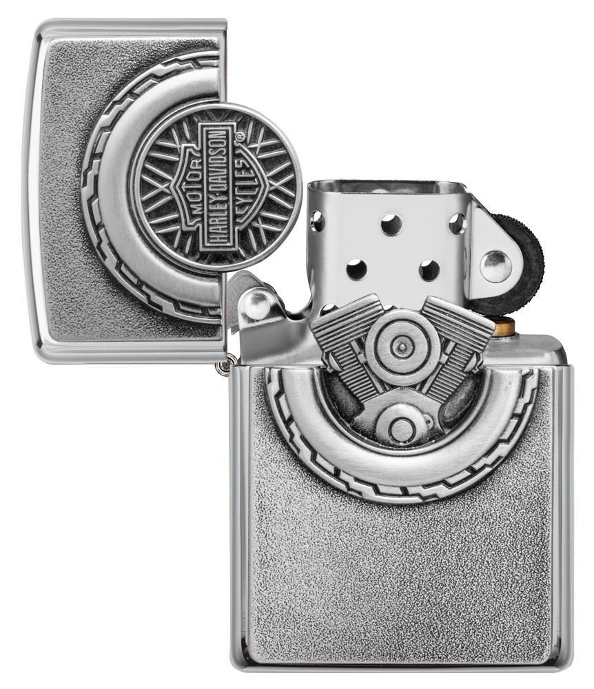 Harley-Davidson® Engine Surprise Emblem Street Chrome Lighter with its lid open and unlit