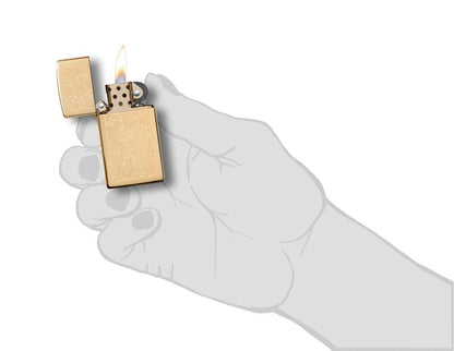 Slim High Polish Brass Venetian Windproof Lighter in hand