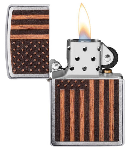 WOODCHUCK USA American Flag Windproof Lighter with its lid open and lit