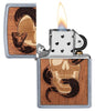 WOODCHUCK USA Skull & Snake Windproof Lighter with its lid open and lit