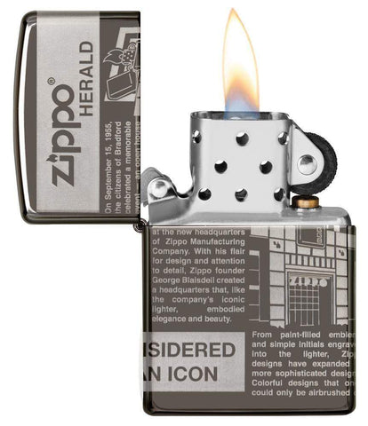 Zippo Newsprint Design Windproof Lighter open and lit