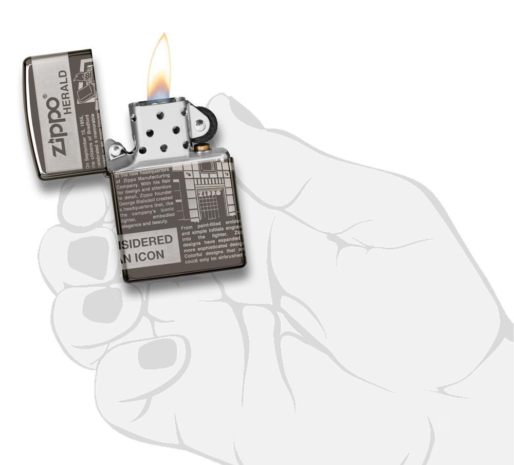 Zippo Newsprint Design Windproof Lighter in hand