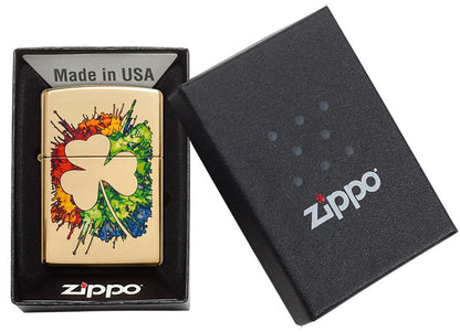 Graffiti Clover Design High Polish Brass Windproof Lighter in its packaging 