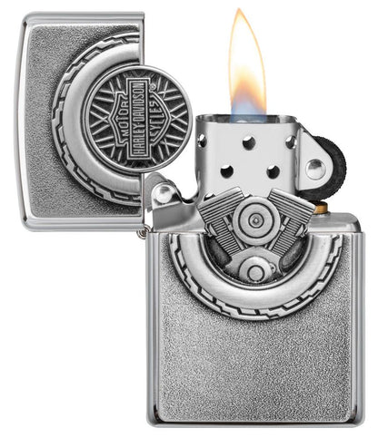 Harley-Davidson® Engine Surprise Emblem Street Chrome Lighter with its lid open and lit
