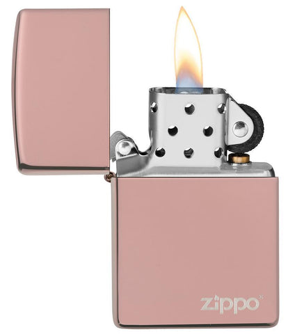 High Polish Rose Gold Zippo Logo windproof lighter with its lid open and lit