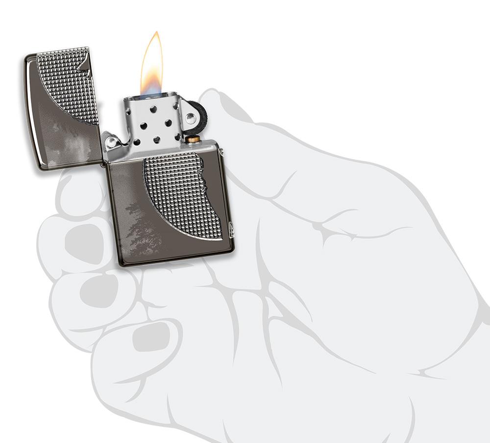 Wolf Design Armor® Black Ice® Windproof Lighter lit in hand