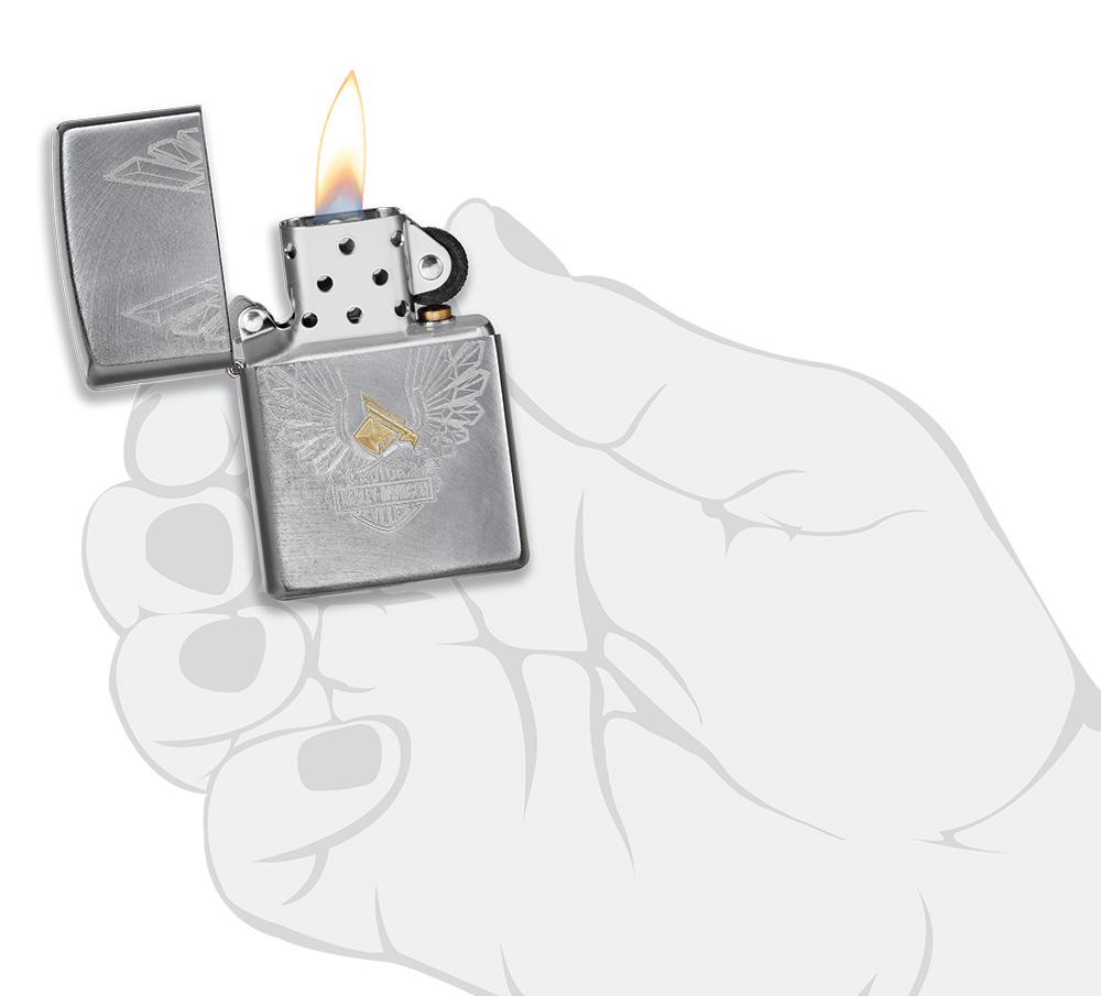 Harley-Davidson® Eagles Logo Chrome Arch Windproof Lighter lit in hand