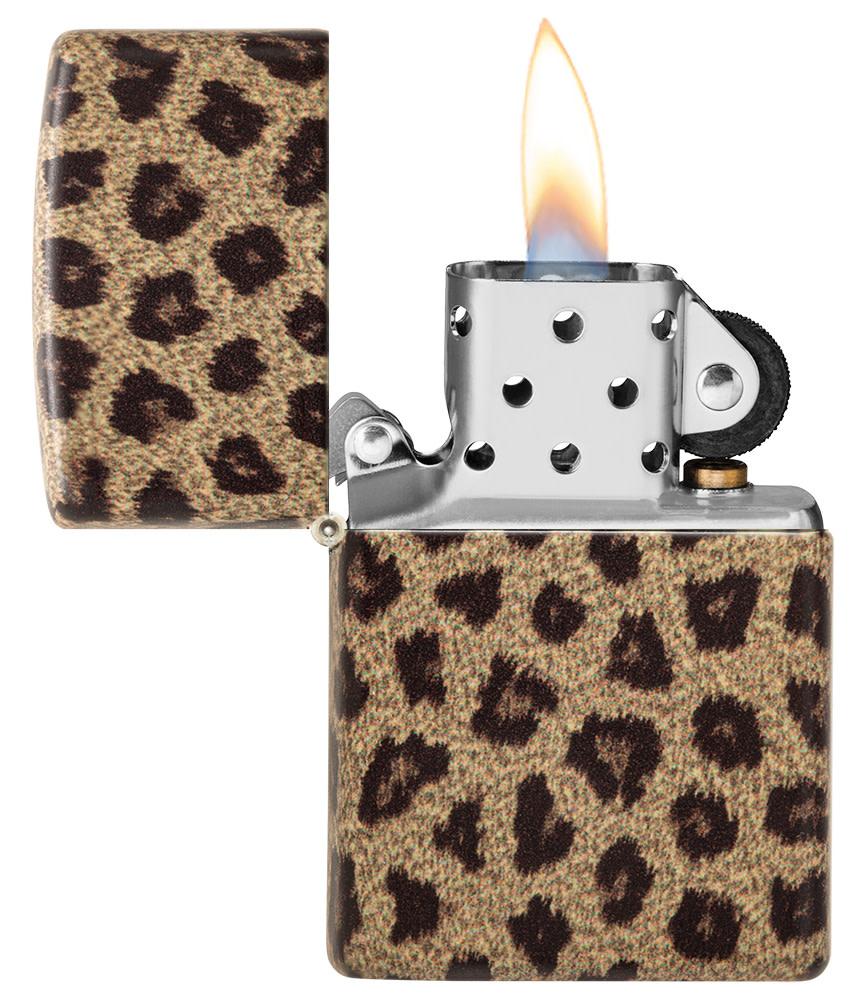 Leopard Print 540 Color Windproof Lighter with its lid open and lit